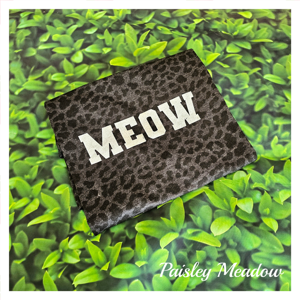 MEOW on black leopard